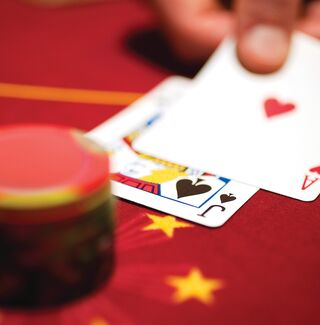 Blackjack hand red table